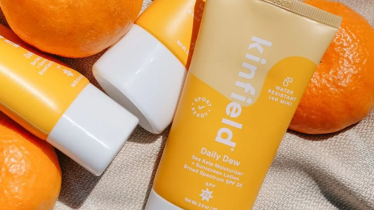 Close up on a plate of mashed potatoes, topped with baked pork chops with cream of mushroom soup, and a side of green beans.