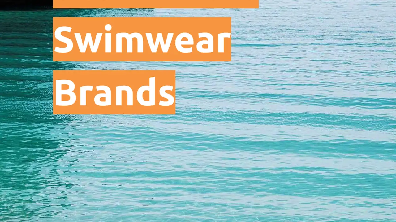 Two mint chocolate milkshakes with whipped cream and green sprinkles.