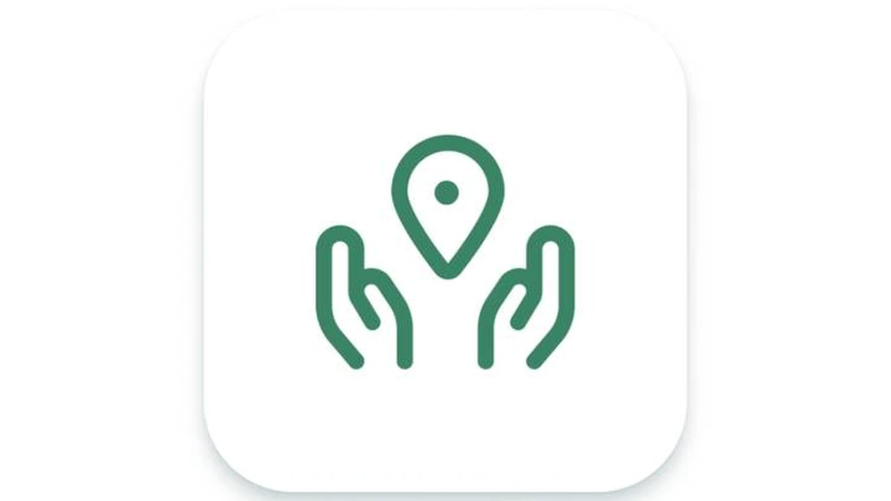 Close up on a plate of mashed potatoes, topped with baked pork chops with cream of mushroom soup, and a side of green beans.