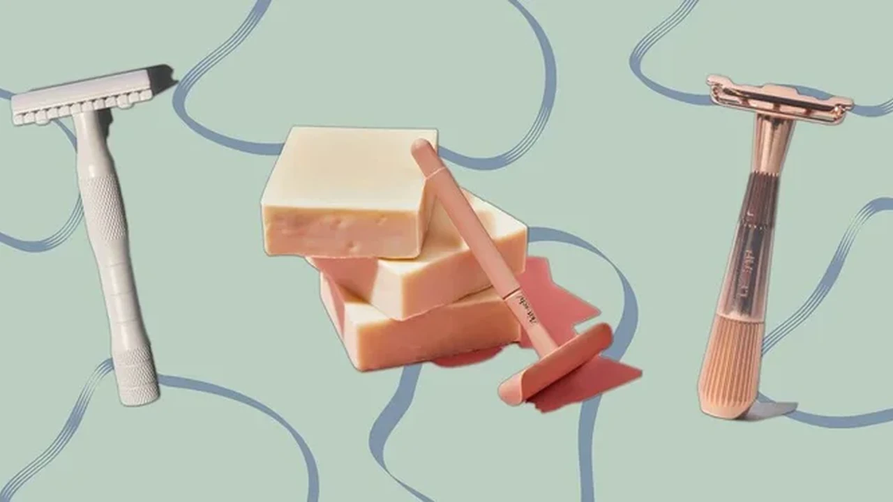 Close up on a plate of mashed potatoes, topped with baked pork chops with cream of mushroom soup, and a side of green beans.