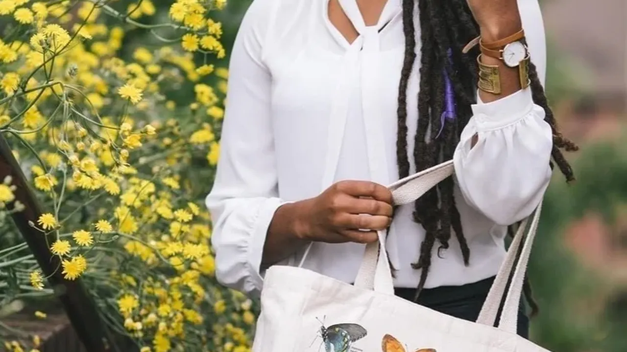 overhead view of corned beef sliced and on a platter with cabbage, potatoes, and carrots
